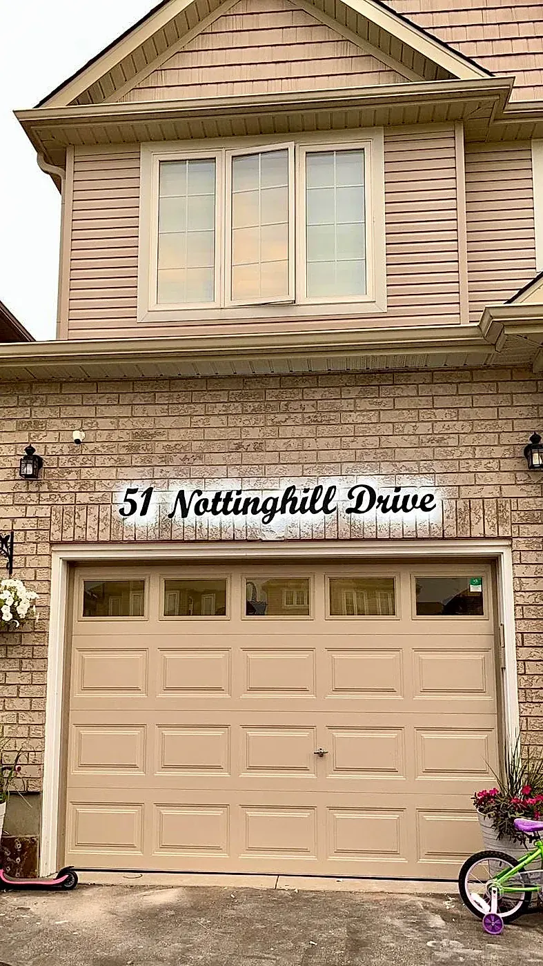 51 Nottinghill Drive above a garage door